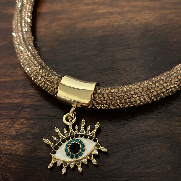 Kurt Geiger Gold and Brown Necklace with Eye Pendant - Picture 2 of 4